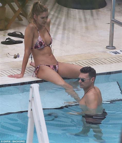 Ryan Seacrest Steals A Kiss From Bikini Clad Shayna Taylor