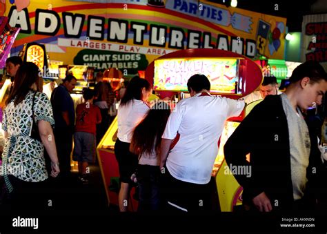 people play  amusement machines  arcade   brighton stock
