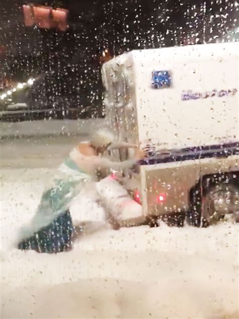 drag queen elsa rescues police van in blizzard 5 million have