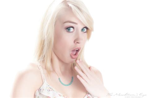 blonde open mouth closeup simple background girl face