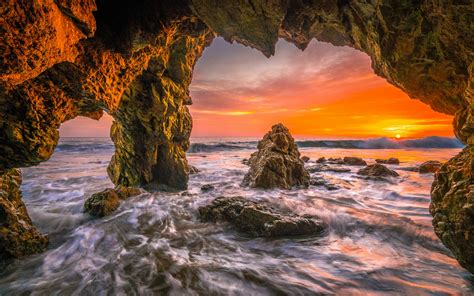 horizon sun sunset sea ocean beach nature cave hd wallpaper