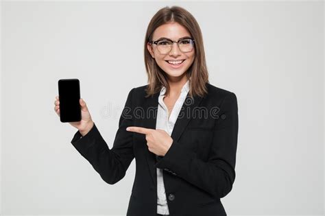 happy businesswoman in eyeglasses with smartphone stock