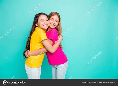 Photo Of Two Hugging Girls Creating Copyspace Loving Each Other As Best