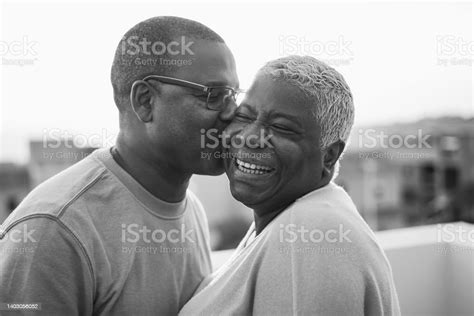 Happy African Couple Having Tender Moment Outdoors At Summer Sunset