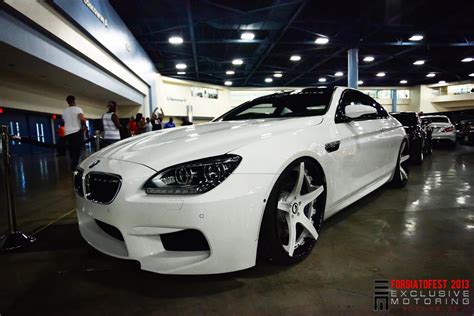 girls dressed  duct tape present bmw   forgiato