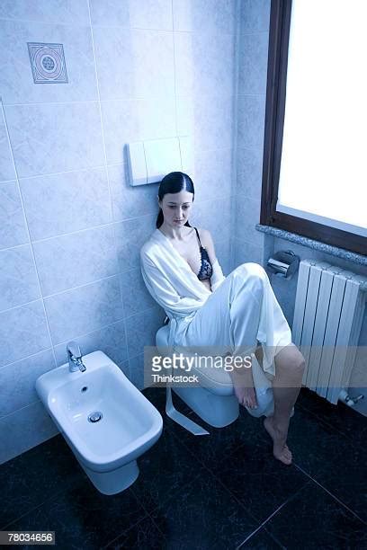 female urinal photos and premium high res pictures getty images