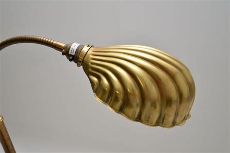 vintage brass clam shell floor lamp  christopher wray retrospective
