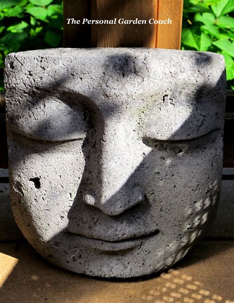 big giant face possibly buddha      large outdoor planters big