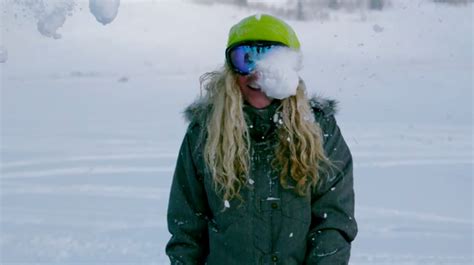 cute girl gets blasted with snowballs to the face in super slo mo