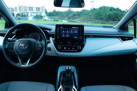toyota corolla sedan review trims specs price  interior images   finder