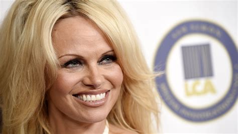 pamela anderson posts nude photo claims she s cured of hepatitis c