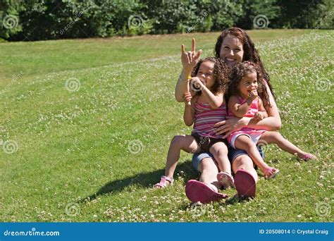 young mother signing  love  stock photo image  sitting close