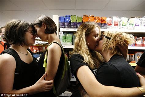 sainsbury s protesters hold kissathon after gay couple