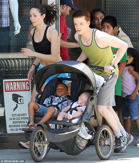 emmy rossum flashes taut stomach while filming jogging scene for shameless with cameron monaghan