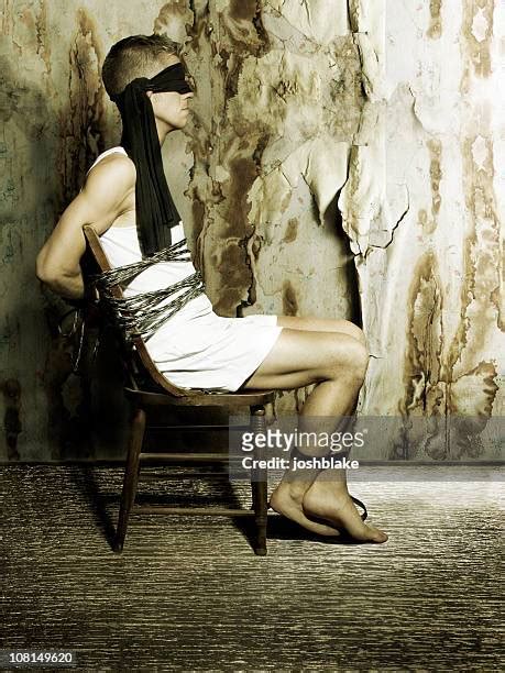 man tied to chair photos et images de collection getty images