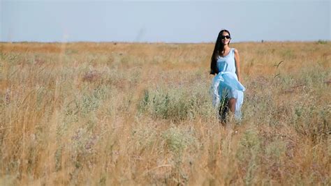 woman walking   kansas wheat field stock footage video  shutterstock
