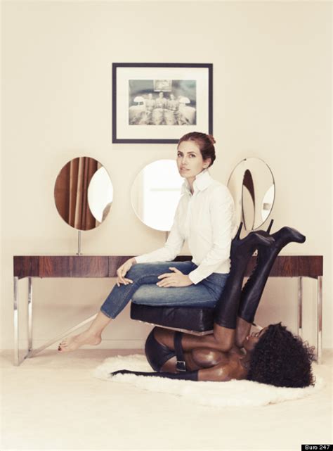 Garage Magazine Editor In Chief Dasha Zhukova Sits On A Black Woman
