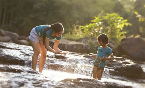 mother with her daughter on the beach stock image image of happiness playing 43415937