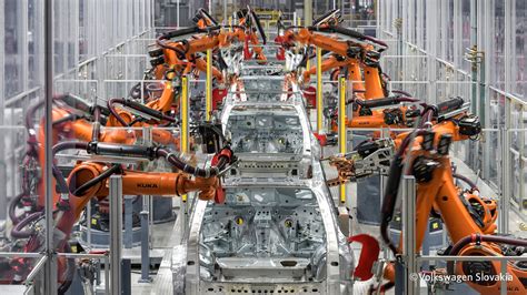 car vehicle robot volkswagen slovakia welding bodywork factory metal industrial kuka
