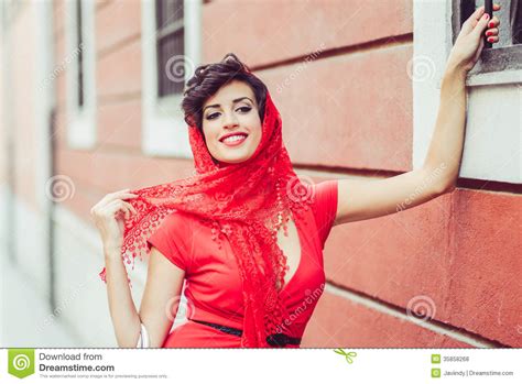 beautiful woman in urban background vintage style stock