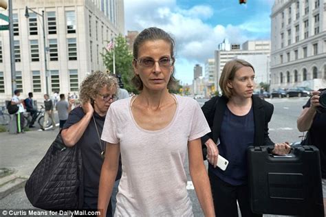 seagram s heiress clare bronfman leaves court after she pleads not