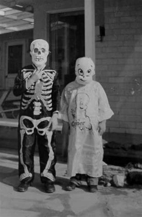 haunting vintage snapshots  skeleton halloween costumes  give
