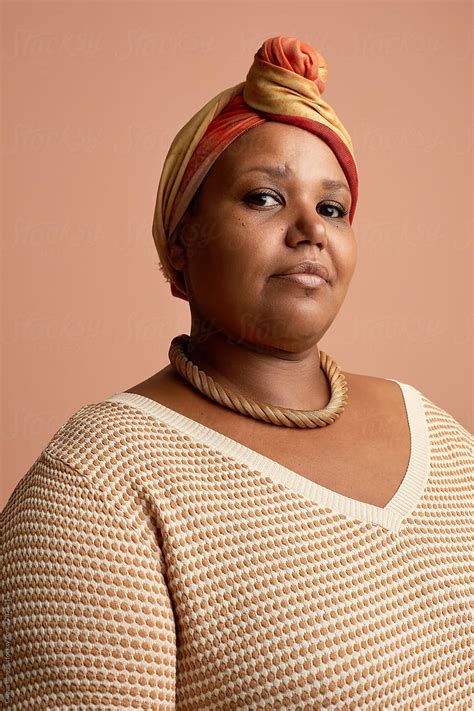 Mature African Woman In Turban By Stocksy Contributor Clique Images