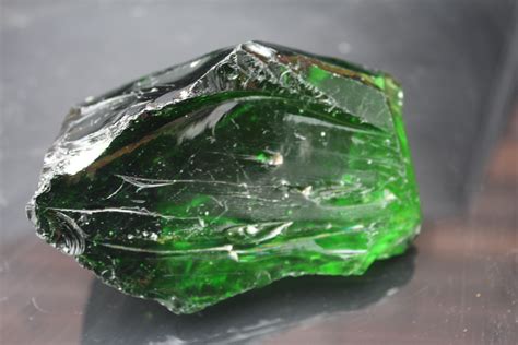 small green obsidian volcanic rock specimen sold   crystals