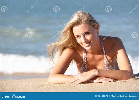 young woman sunbathing  beach stock image image  summer female