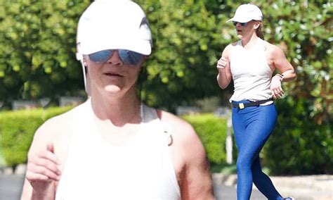 Reese Witherspoon Shows Off Her Athletic Prowess In Clinging Blue