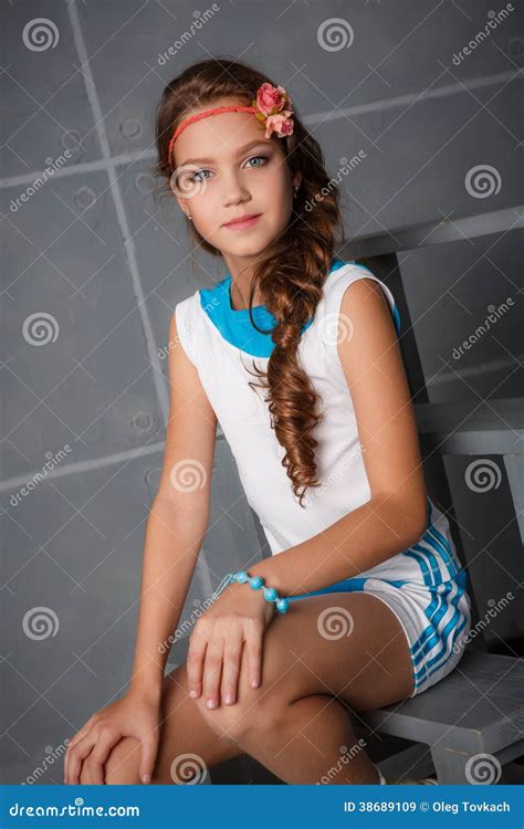 teenage girl sitting  studio stock image image  portrait full