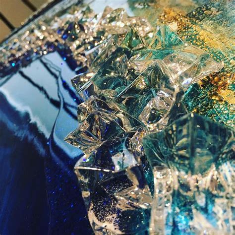 glistening resin tables designed to look like beautiful geode slices