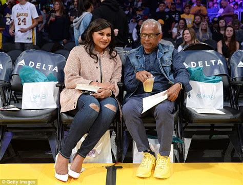 mindy kaling takes her dad to basketball to watch lakers daily mail online