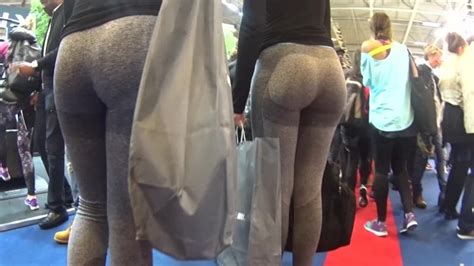 two candid fit asses in grey yoga pants walking thumbzilla