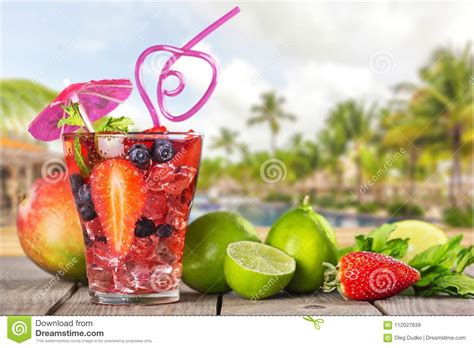 glass of cocktail with berries and fruits on stock image image of