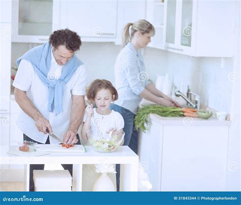 family preparing healthy meal  kitchen stock photo image