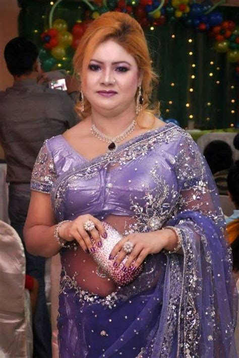spicy desi housewife of real life in saree and cleavage photo