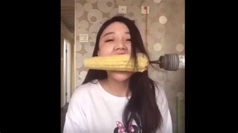 watch woman attempting the corn drill challenge has hair ripped off