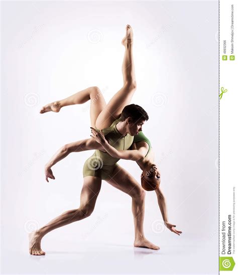 Couple Of Gymnasts Posing On A Light Background Stock