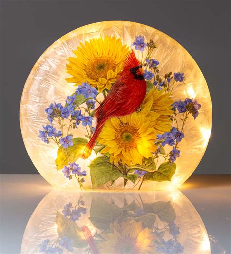 lighted cardinal  sunflowers crackled glass tabletop art wind  weather
