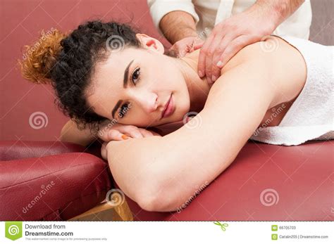 Woman In Wellness Spa Center Having Back Massage Stock