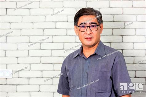 Portrait Of Asian Handsome Senior Elderly Man Wear Eyeglasses On White