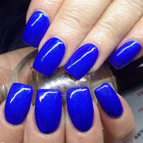 experience the glamorous style of royal blue nail designs be modish