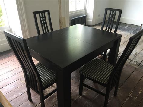 black solid wood extendable dining table  chairs  sunderland