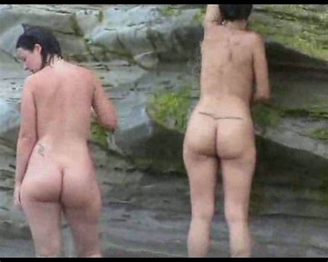 two curvy latina chicks expose their big asses on the nude beach video