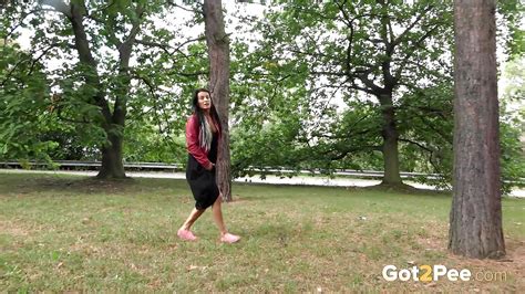 dark haired mature lexi lifting her long skirt and pissing in the park
