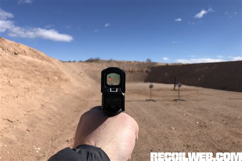 hands    aimpoint acro p  shot  recoil