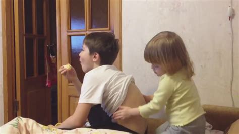 little sister massage for brother when brother is watching