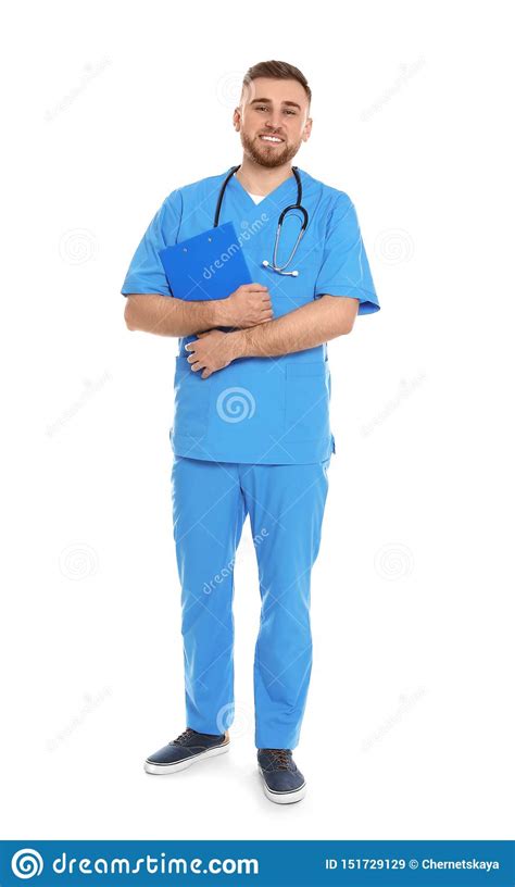 Full Length Portrait Of Medical Doctor With Clipboard And