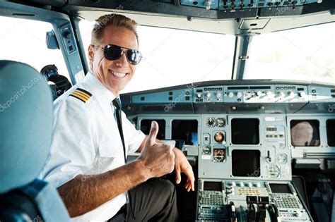 pilot showing  thumb  stock photo  gstockstudio